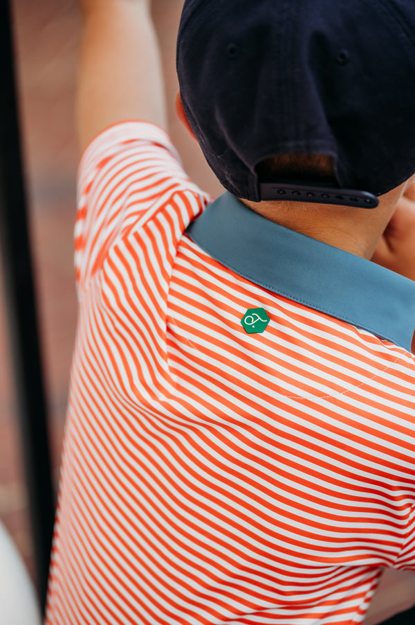 THE PERFORMANCE POLOS